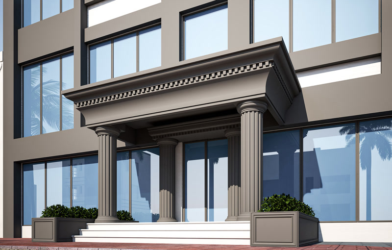 Sistem Portic Exterior si Coloane Decorative din Poliuretan Porticul de intrare realizat din profile din poliuretan de înaltă densitate reprezintă o soluție tehnico-decorativă avansată pentru finisarea fațadelor moderne și clasice, oferind rezistență ridicată la factorii atmosferici. În acest proiect, structura porticului este susținută vizual de ansambluri formate din coloane canelate P5840 și P5860, ancorate la bază prin elementele structurale decorative P5940 și P5960. Spre deosebire de beton sau piatră naturală, materialul dens din poliuretan cu o densitate de 150-220 kg/m³ (țintă ~160 kg/m³) reduce considerabil sarcina suplimentară pe fundația clădirii, facilitând totodată manipularea și montajul rapid pe șantier.

Detaliile arhitecturale superioare ale cornisei și ale antablamentului sunt realizate prin combinarea profilelor multifuncționale P1456D, P1460M10 și P1473. Procesul de instalare implică fixarea mecanică dublată de lipirea structurală cu adeziv poliuretanic special aplicat într-un strat de 2 mm până la 3 mm. Îmbinările dintre profile sunt procesate cu chituri elastice dedicate, rezistente la fluctuațiile termice cuprinse între -100 °C / +80 °C, prevenind apariția fisurilor în timp cauzate de dilatare sau contracție.

Sistemul de profilare din poliuretan prezintă o rată de absorbție a apei de sub 1%, ceea ce elimină riscul de degradare prin îngheț-dezgheț sau de apariție a mucegaiului în spațiile de intrare expuse umidității. Suprafețele exterioare ale coloanelor P5840 și ale ancadramentelor P1473 sunt pregătite prin șlefuire fină cu hârtie abrazivă cu granulație de 220, urmată de aplicarea unei amorse acrilice de profunzime. Finisajul exterior este realizat în 2 straturi de vopsea lavabilă elastomerică de culoare gri antrasit mat, oferind protecție UV durabilă.

Pentru firmele de construcții și montatori, utilizarea elementelor presate din poliuretan reduce timpul de execuție la fața locului cu peste 50% comparativ cu tencuielile clasice din ipsos sau mortar trase la șablon. Rezultatul final oferă o geometrie perfectă a liniilor de cornișă, o îmbinare precisă între secțiunile de colț și o durabilitate crescută la impact mecanic pe întreaga zonă de acces a clădirii.