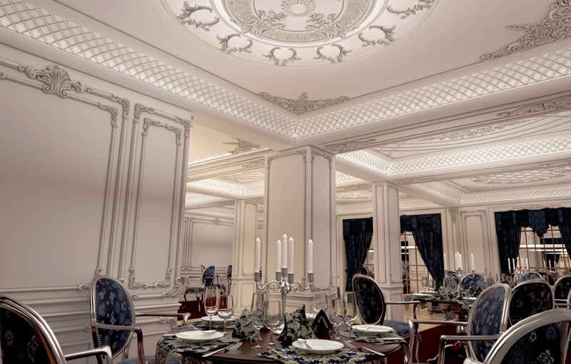 Profiluri din Poliuretan pentru Tavan și Perete în Săli de Evenimente Profilurile decorative din poliuretan de înaltă densitate (150-220 kg/m³ (țintă ~160 kg/m³)) constituie soluția tehnică optimă pentru finisarea tavanelor ornamentale și a pereților în spații comerciale de mari dimensiuni. În amenajările cu cerințe acustice și estetice ridicate, polimerul rigid asigură o stabilitate dimensională excelentă la fluctuații de temperatură între -100 °C / +80 °C, prevenind apariția fisurilor la îmbinări. Datorită ratei de absorbție a apei de sub 1%, materialul nu se deformează în timp și permite aplicarea rapidă a vopselelor acrilice sau pe bază de apă, optimizând timpul de execuție pe șantier.

Realizarea tavanului casetat cu motive geometrice și scafe perimetrale necesită un sistem riguros de fixare mecano-chimică. Cornișele late din poliuretan și profilele de contur sunt fixate pe structura gips-carton prin adezivi poliuretanici structurali de înaltă aderență, dublați de șuruburi mecanice îngropate. În zonele de tranziție ale scafelor pentru iluminat indirect, rezistența mecanică a polimerului permite debitarea la unghiuri precise de 45 de grade, facilitând obținerea unor colțuri perfect aliniate și fără rosturi vizibile după șlefuirea cu abraziv de granulație P240.

Placarea stâlpilor de susținere și a pereților principali se realizată prin aplicarea baghetelor și a ancadramentelor din poliuretan profilat, create special pentru a rezista la impact accidental moderat. Miezul dens al materialului absoarbe vibrațiile structurale din sală fără a compromite aderența la suport. Îmbinările dintre elemente se tratează cu adeziv special de sudură la rece pentru poliuretan, iar punctele de fixare se chituesc cu paste acrilice elastice, garantând o suprafață omogenă gata de vopsire.

Spre deosebire de stucaturile tradiționale din ipsos, elementele din poliuretan reduc greutatea totală suspendată pe tavan cu peste 70%, eliminând suprasolicitarea structurilor existente. Această greutate redusă simplifică logistica pe șantier și accelerează ritmul de instalare pentru echipele de montaj. Eficiența tehnică și durabilitatea pe termen lung fac din poliuretan alegerea ideală pentru proiecte de anvergură în spații publice și săli de nunți.