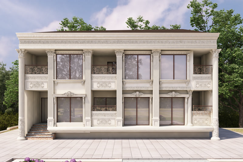 Poliuretan Fațadă Clasică și Coloane Decorative Exterioare Fațada exterioară din poliuretan de înaltă densitate reprezintă o soluție tehnică avansată pentru finisarea clădirilor rezidențiale, combinând greutatea redusă cu o rezistență mecanică sporită. Spre deosebire de betonul decorativ sau ipsosul tradițional, spuma rigidă de poliuretan cu densități cuprinse între 180 și 150-220 kg/m³ (țintă ~160 kg/m³) previne încărcarea structurală a clădirii și elimină punțile termice. Materialul prezintă o rată de absorbție a apei de sub 1% și rezistă la fluctuații termice severe cuprinse între -100 °C / +80 °C. Aceste proprietăți fizico-chimice împiedică apariția fisurilor cauzate de ciclurile repetate de îngheț-dezgheț, garantând o stabilitate dimensională pe termen lung a întregului ansamblu arhitectural.

Montajul ancadramentelor de ferestre realizate din profilele P1456, P1456D, P1458 și P1462 necesită o metodologie de aplicare mixtă, bazată pe lipire chimică structurală și fixare mecanică auxiliară. Înainte de instalare, suprafața suport din tencuială sau sistem termoizolant trebuie curățată, uscată și amorsată corespunzător. Se utilizează adezivi poliuretanici monocomponenți cu timp rapid de polimerizare, iar îmbinările dintre profile se fixează mecanic prin șuruburi din oțel inoxidabil îngropate. Pentru mascarea capetelor de fixare și a rosturilor de dilatare de 2-3 mm, se aplică un chit elastomeric bicomponent rezistent la intemperii, urmat de o șlefuire fină cu granulație progresivă.

Sistemele de coloane exterioare P5840 și P5940B, alături de pilatrii profilați P5030 și P5030B, funcționează ca teci decorative instalate în jurul elementelor de rezistență din beton armat sau structuri metalice. Capitelurile sculptate și bazele profilate sunt îmbinate prin secționare la unghi de 45 de grade și lipire chimică pe muchii. Zona balcoanelor integrează panouri orizontale în relief P82210 și elemente de sprijin tip consolă P6002, ancorate direct în placa de etaj. Frontoanele și ornamentele P2839, P80115S și P8088C întăresc compoziția arhitecturală fără a adăuga o greutate suplimentară pe consola de cornișă a acoperișului.

Faza finală de finisare a elementelor decorative din poliuretan implică acoperirea întregii suprafețe cu o vopsea acrilică sau elastomeric-siliconică pentru exterior, rezistentă la razele UV și la poluarea atmosferică. Straturile succesive de vopsea previn degradarea suprafeței și conferă un efect hidrofob suplimentar. În comparație cu soluțiile clasice din piatră naturală sau mortar de ciment, ornamentele poliuretanice nu necesită lucrări periodice de reparație sau impermeabilizare, menținându-și aspectul inițial pe o durată de peste 15 ani fără întreținere complexă.