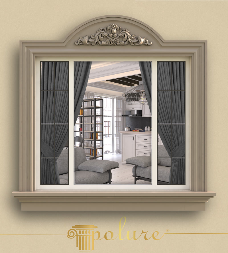Ancadramente din Poliuretan și Fronton Decorativ pentru Ferestre Sistemul decorativ de exterior din poliuretan pentru ferestre, format din profilele de contur P1454 și P1458 alături de frontonul ornamental P2833, reprezintă o soluție tehnică avansată pentru finisarea fațadelor clasice. Poliuretanul de înaltă densitate, având o valoare de peste 150-220 kg/m³ (țintă ~160 kg/m³), asigură o stabilitate structurală de lungă durată și o rată de absorbție a apei de sub 0.1%. Această caracteristică previne umflarea, exfolierea sau fisurarea elementelor decorative expuse la ciclurile de îngheț-dezgheț, depășind net performanțele tencuielilor tradiționale din ipsos sau ciment.

Procesul de montaj al ancadramentelor verticale și orizontale P1454 și P1458 necesită pregătirea riguroasă a suprafeței suport și debitarea la unghi de 45 de grade a colțurilor de îmbinare. Pentru fixare se utilizează adezivi structurali poliuretanici cu priză rapidă, recomandați pentru utilizare la exterior, aplicați în cordon continuu pe spatele profilelor. La îmbinările dintre profile se păstrează un rost tehnic de dilatare de 2-3 mm, care se sigilează cu adeziv special pentru lipirea îmbinărilor, prevenind apariția microfisurilor cauzate de dilatarea termică.

Comparativ cu elementele clasice din polistiren expandat (EPS) sau beton decorativ, profilele din poliuretan furnizate pentru fațade își mențin integritatea mecanică în intervalul de temperatură de la -100 °C / +80 °C. Materialul este rezistent la impact mecanic moderat și permite o prelucrare facilă pe șantier. După polimerizarea completă a adezivului, zonele de îmbinare se șlefuiesc mecanic utilizând hârtie abrazivă cu granulație de 180-240, obținându-se o suprafață perfect continuă, pregătită pentru aplicarea amorsei și a vopselei de exterior.

Piesa centrală a ansamblului, frontonul sculptat P2833, se montează în partea superioară a ancadramentului, oferind un punct de focalizare vizuală cu detalii sculpturale precise. Elementul se fixează suplimentar cu piese de ancorare mecanică inoxidabile pentru a garanta siguranța la sarcini din vânt puternic. Aplicarea finală a unei vopsele lavabile acrilice sau elastomerice rezistente la raze UV protejează structura din poliuretan și asigură o durabilitate de lungă durată, fără necesitatea unor lucrări frecvente de întreținere.