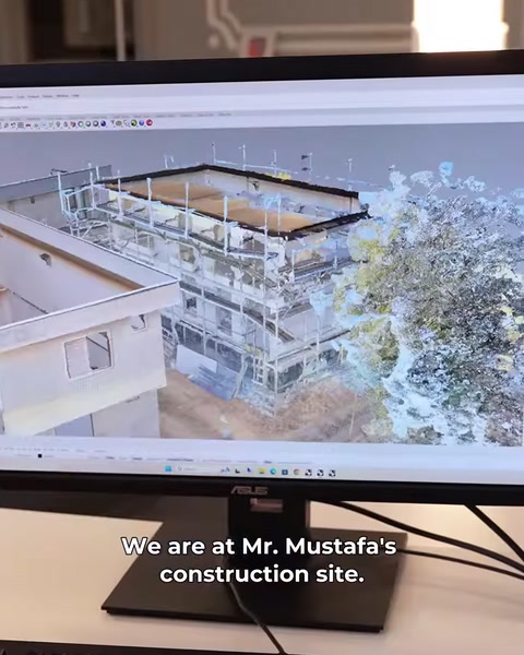 Modelul digital al clădirii apare pe ecranul computerului
